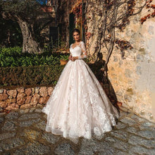 Load image into Gallery viewer, A Line V neck Lace Appliques Illusion Long Sleeves  Wedding Dress